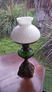 Antique cast iron base kerosene lamp