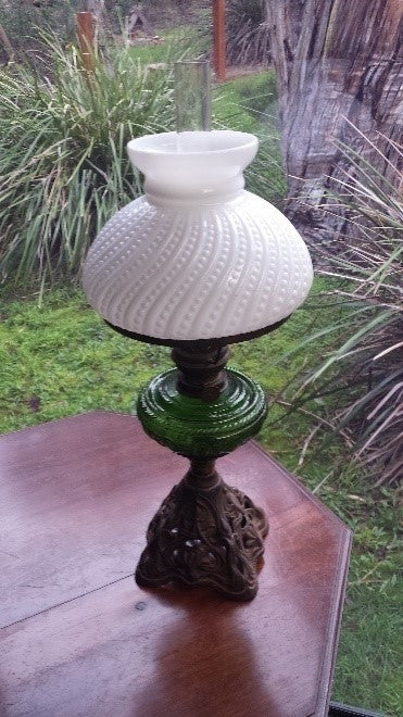 Antique cast iron base kerosene lamp