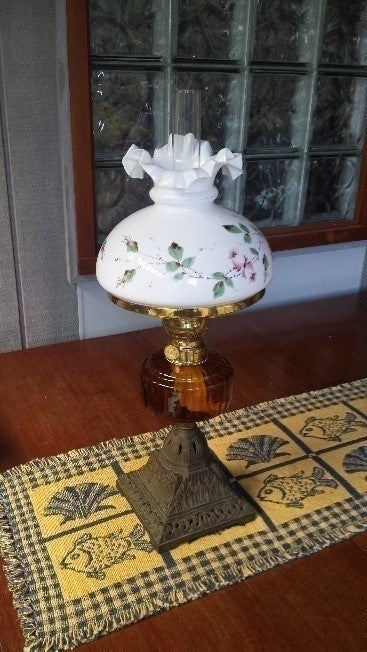 Antique cast base amber bowl kero lamp.